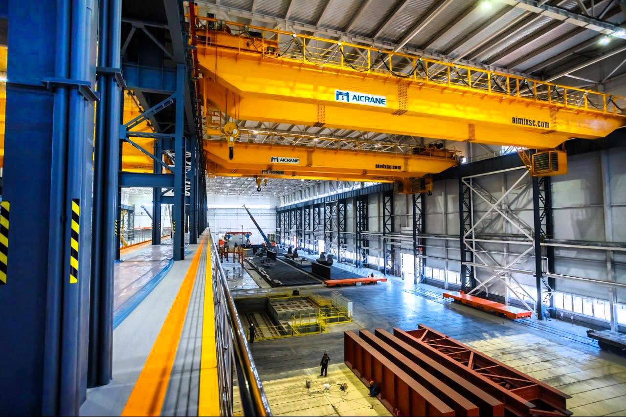 Apples in a factory conveyor belt.