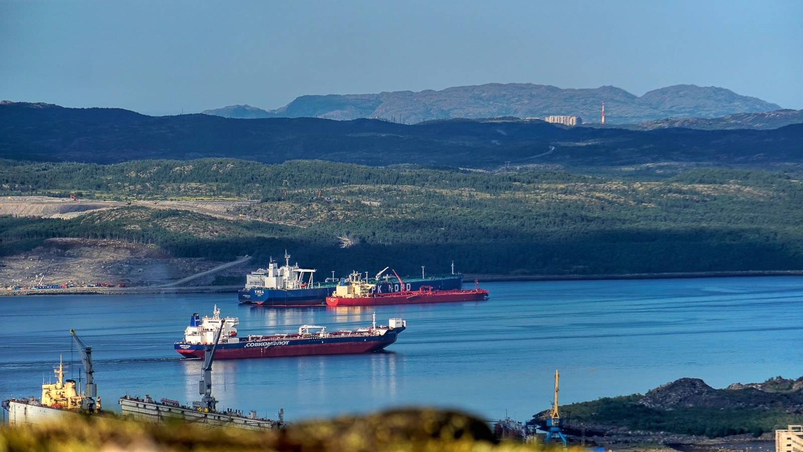 Stacked shipping containers.